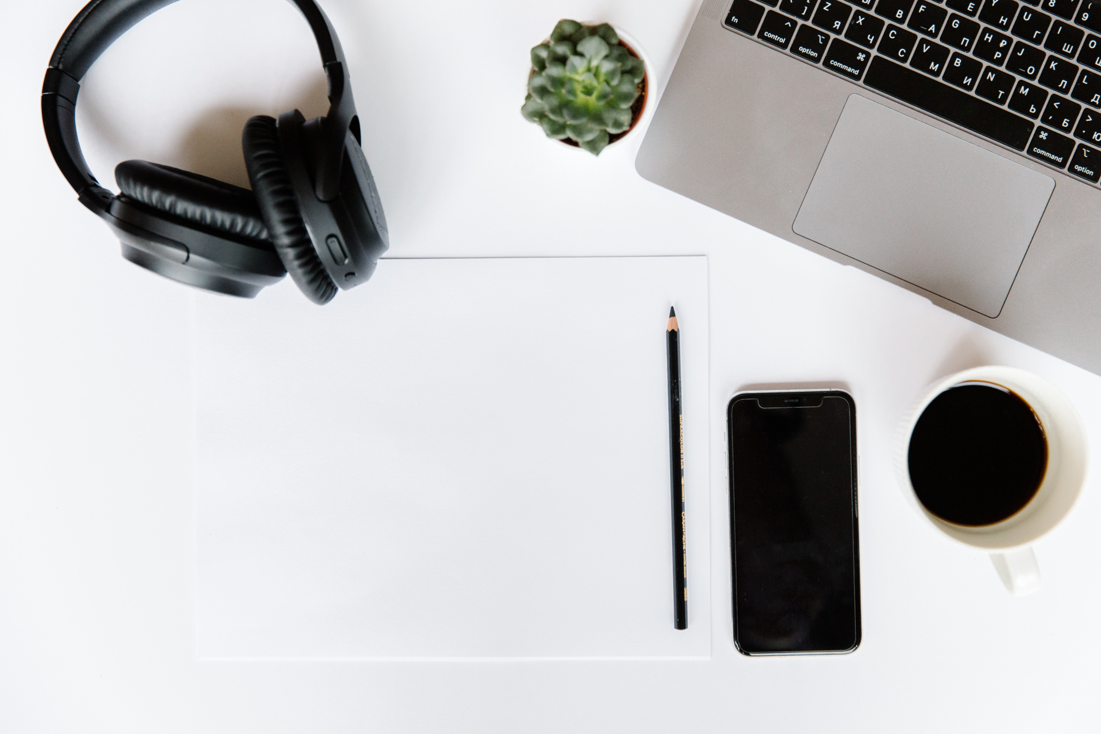 Laptop, Coffee, Cellphone and Headphones